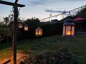 tealights at dusk in the garden